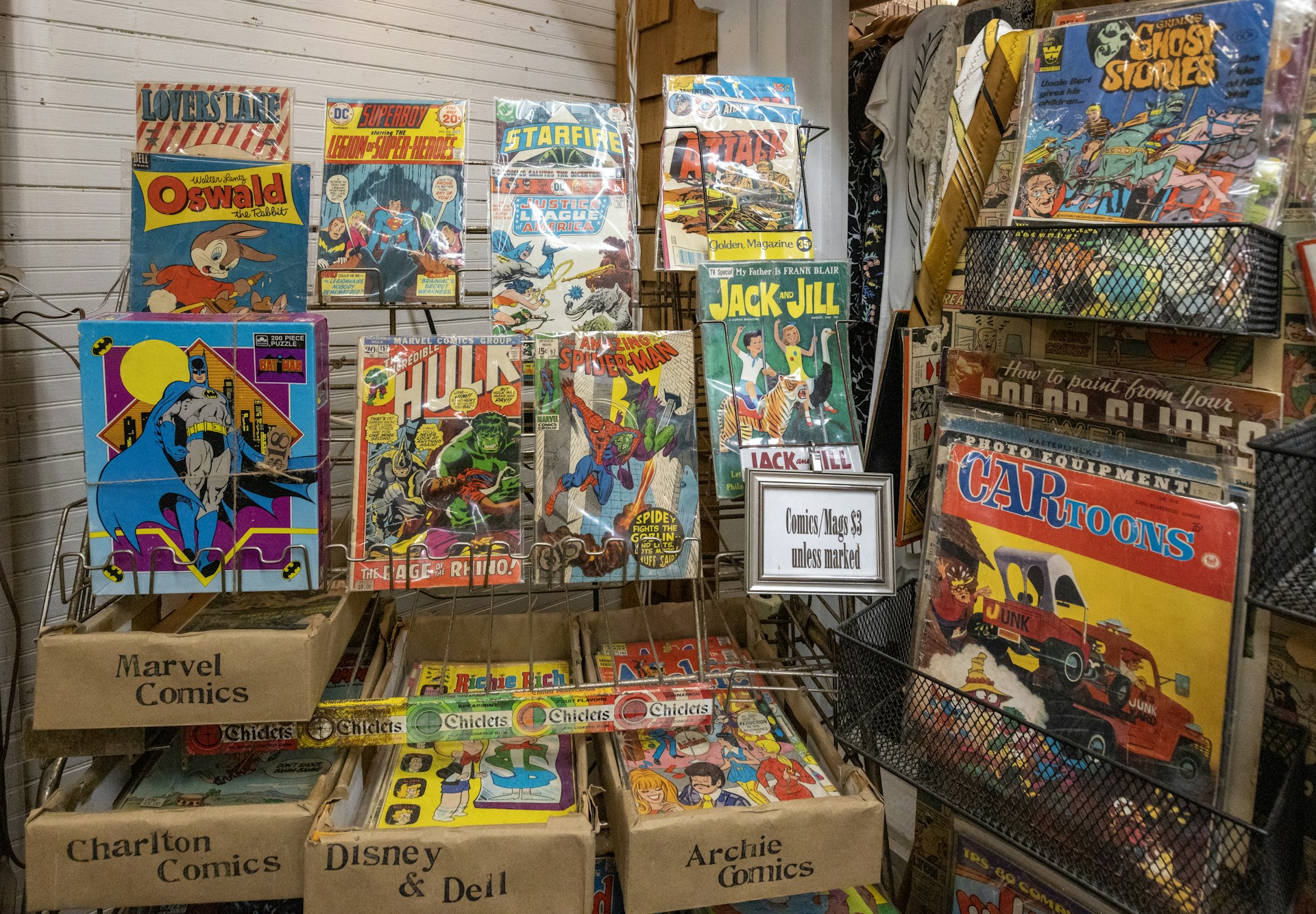 Vintage comics displayed in racks and browsing bins